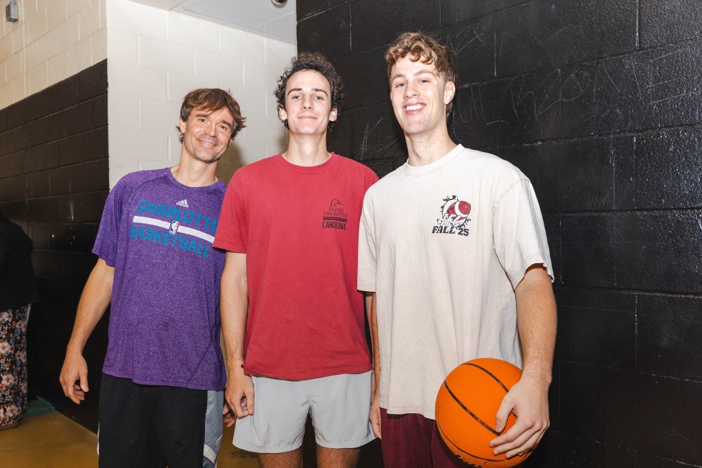 Youth and mentors together during a basketball program session
