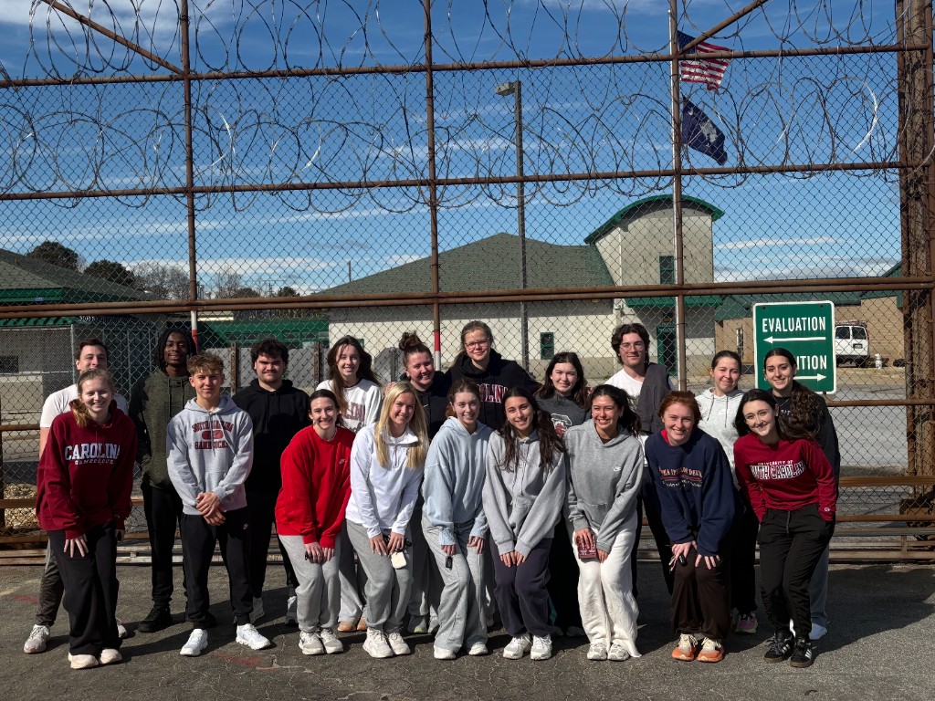 Carolina club volunteers with youth at a South Carolina detention facility